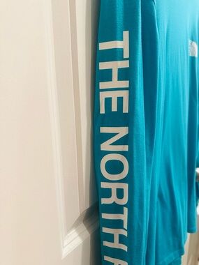 The North Face Teal Long Sleeve Tee with White Sleeve Text